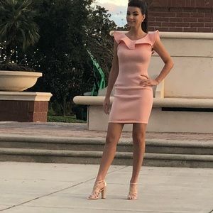 Beautiful scuba peach colored dress, form fitting, very flattering size small